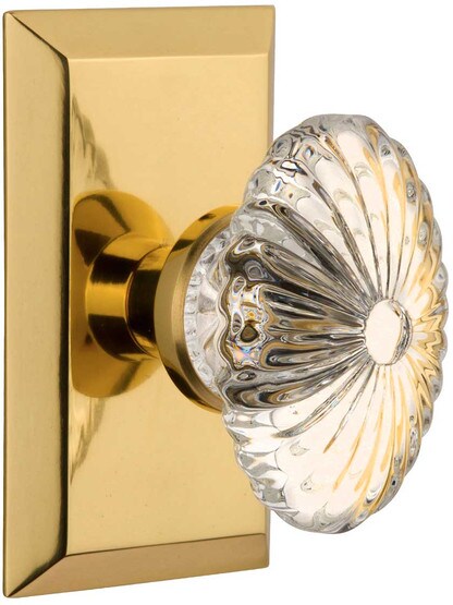 New York Rosette Door Set with Oval Fluted-Crystal Glass Knobs in Polished Brass.